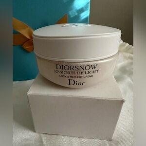 DIORSNOW ESSENCE OF LIGHT LOCK & REFLECT CREME